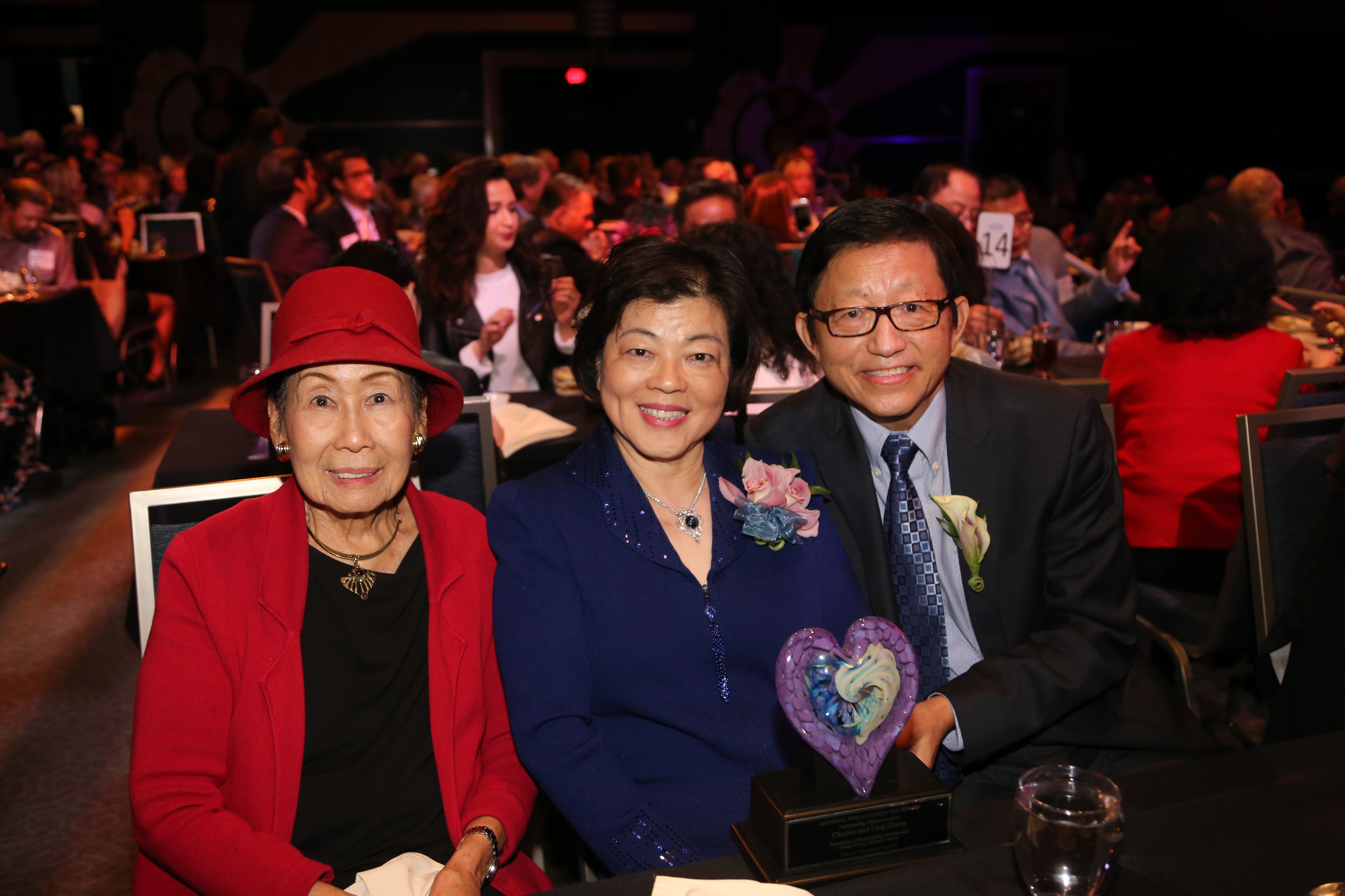 #9 Outstanding Philanthropists Ling and Charlie Zhang, right, with their mentor Ruth Ding, left 563